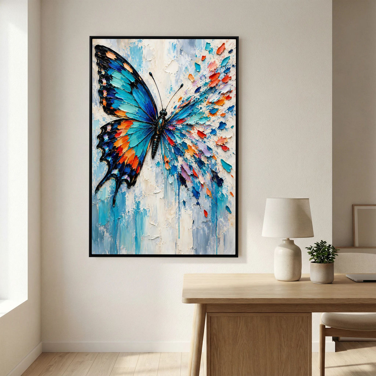 Gerahmtes Leinwandbild mit abstraktem Schmetterling in Türkis, Blau und Orange